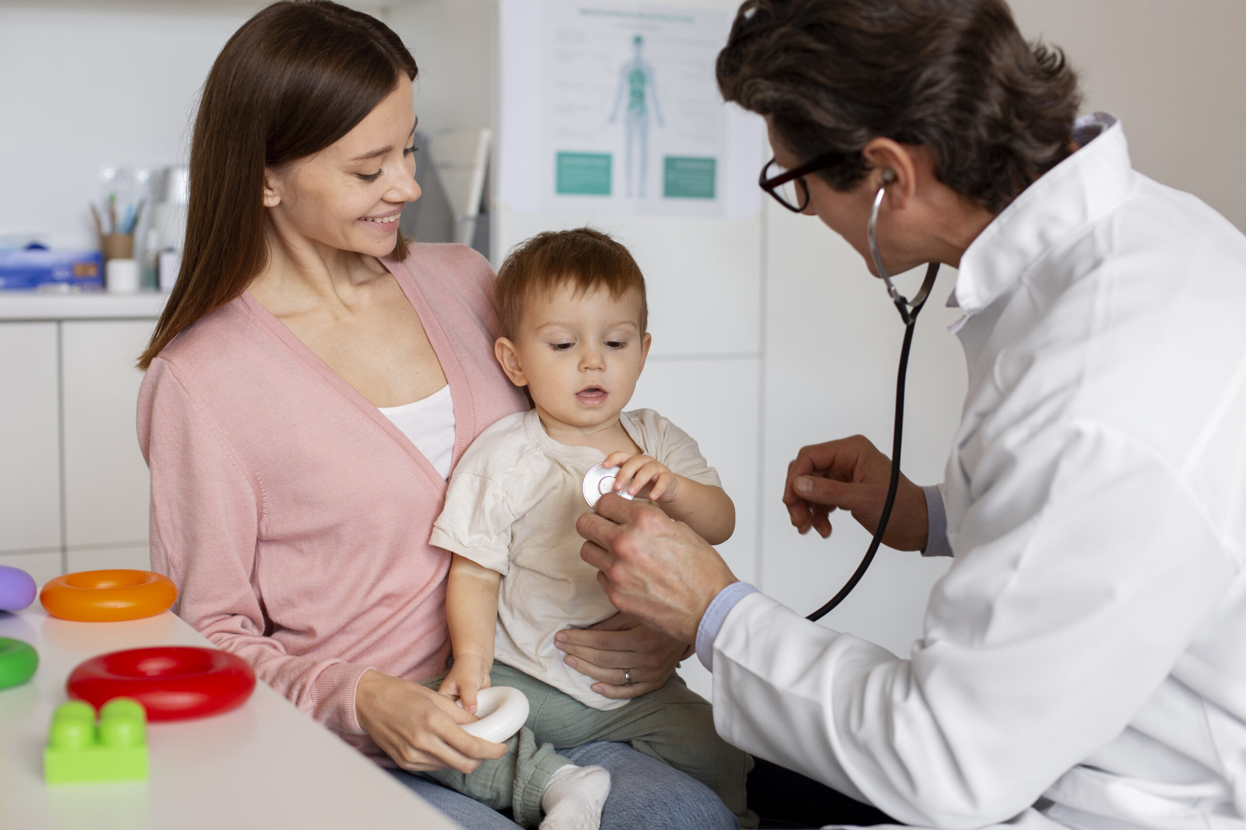 Pediatrician examining a child